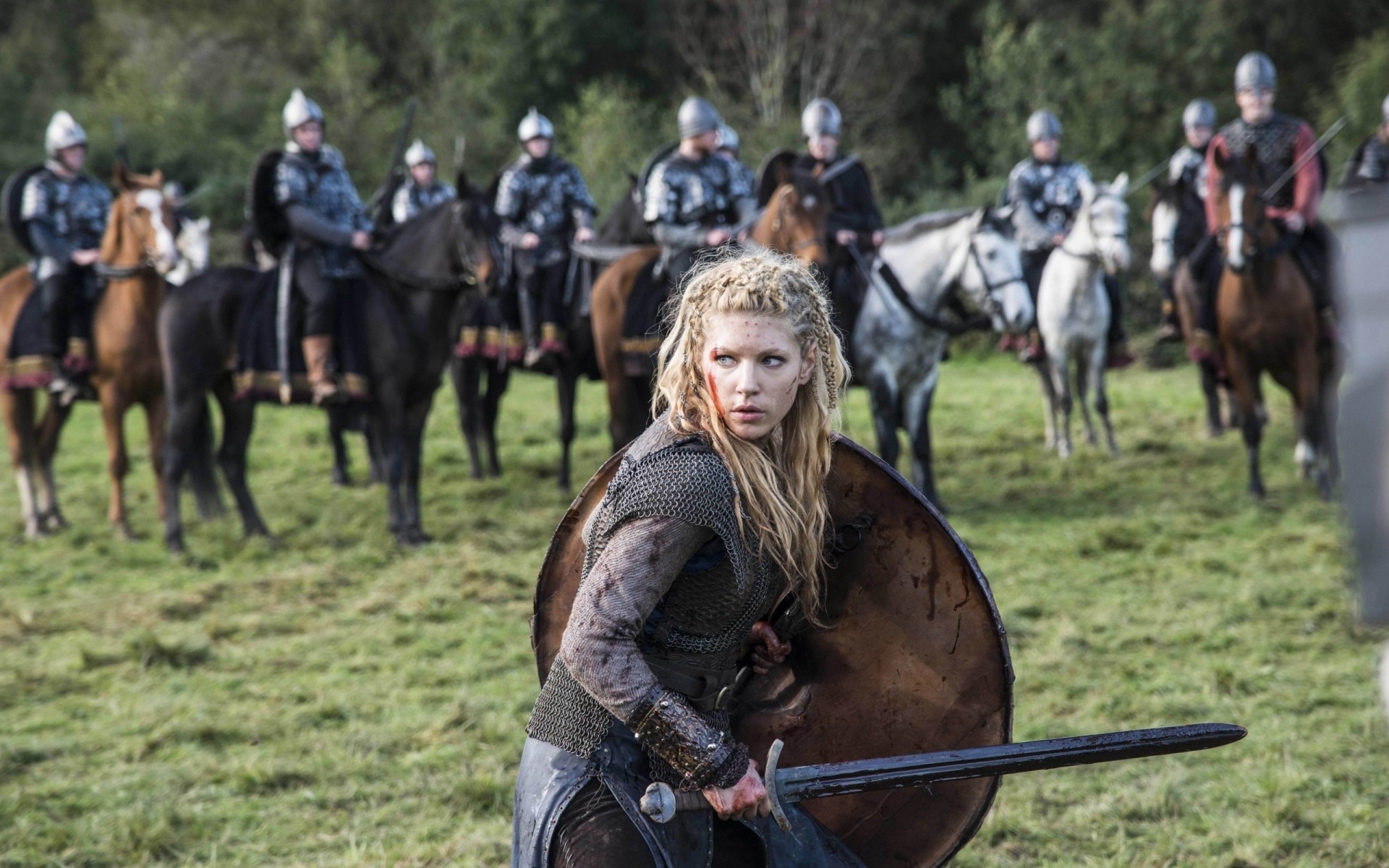 tv series cavalry military equestrian war sitting army competition weapon recreation mammal horse jockey soldier combat gun group race battle rider vikings lagertha katheryn winnick sword shield