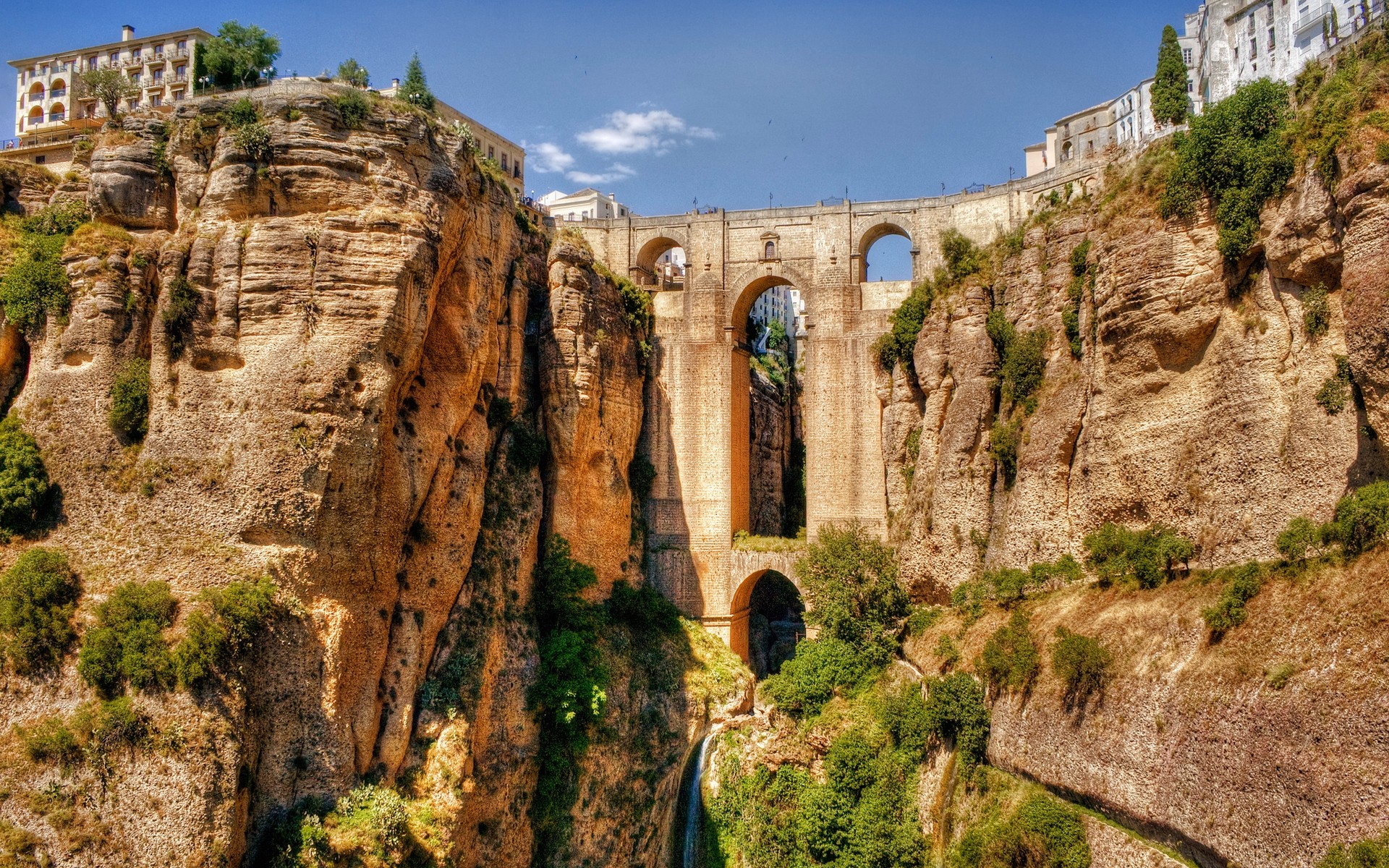 spain travel ancient old architecture rock tourism sky landscape landmark nature stone sight historic outdoors monument building scenic mountain summer wall ronda aqueduct bridge arch