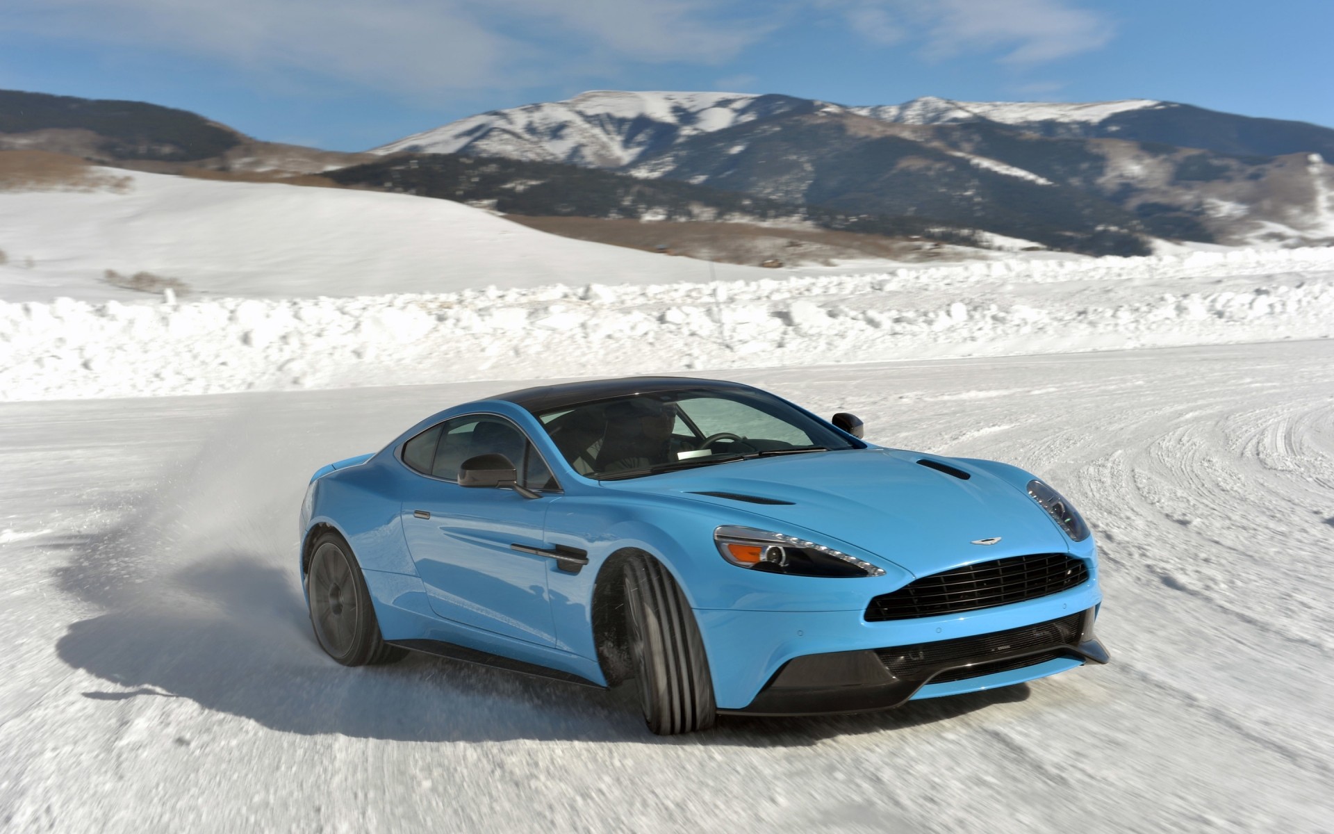 aston martin snow winter car hurry ice travel fast action cold vehicle sport