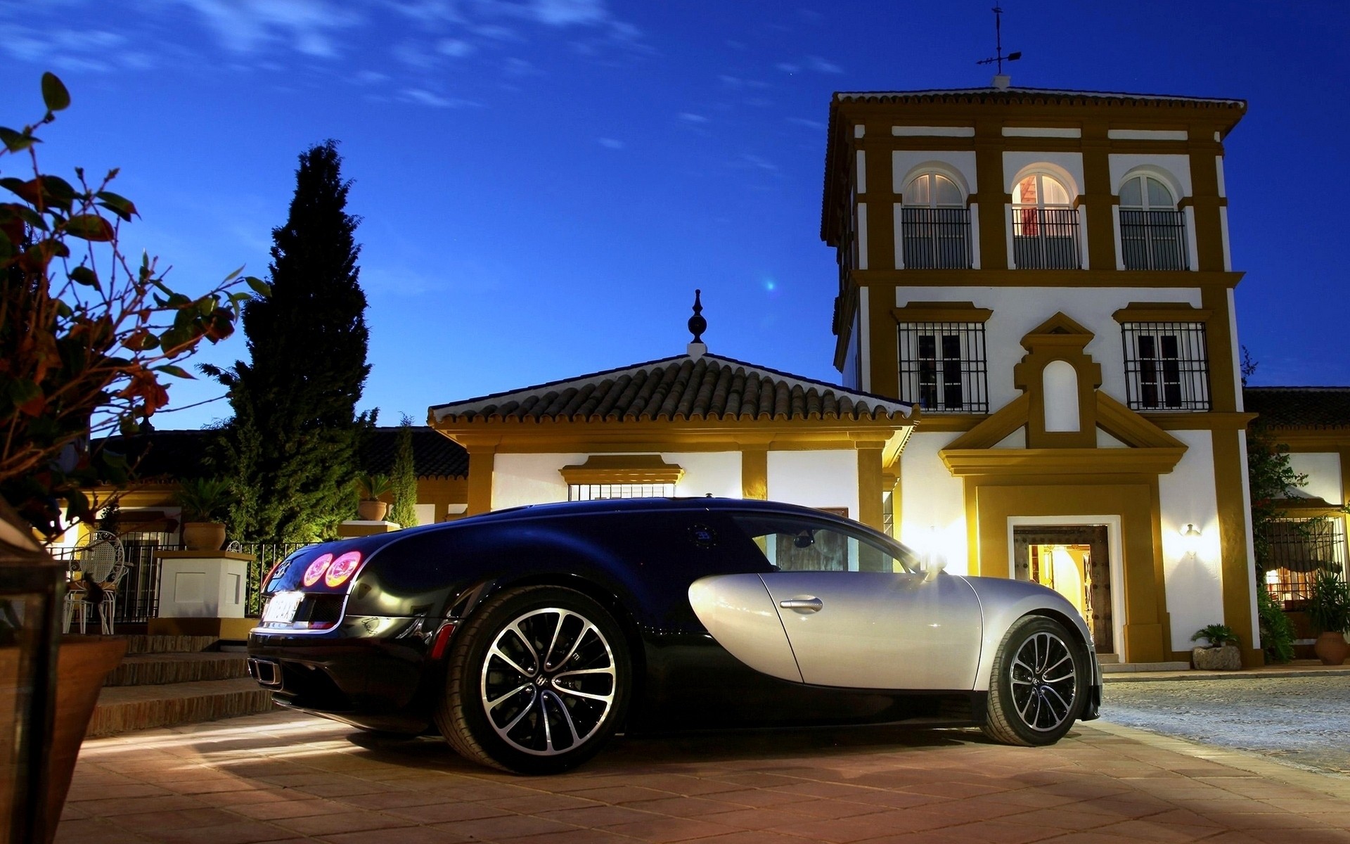 bugatti voiture voiture voyage architecture rue trottoir à l extérieur ciel système de transport bugatti veyron