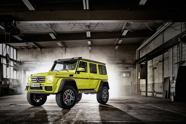 Mercedes in the garage on high wheels