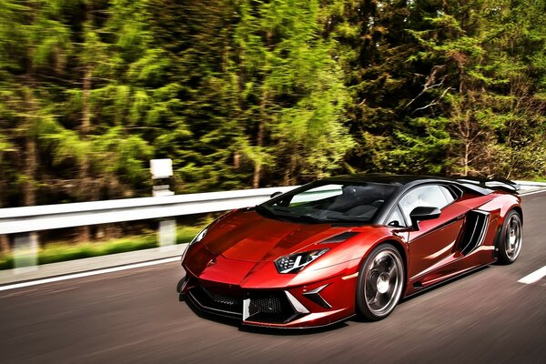 Red racing car on the track