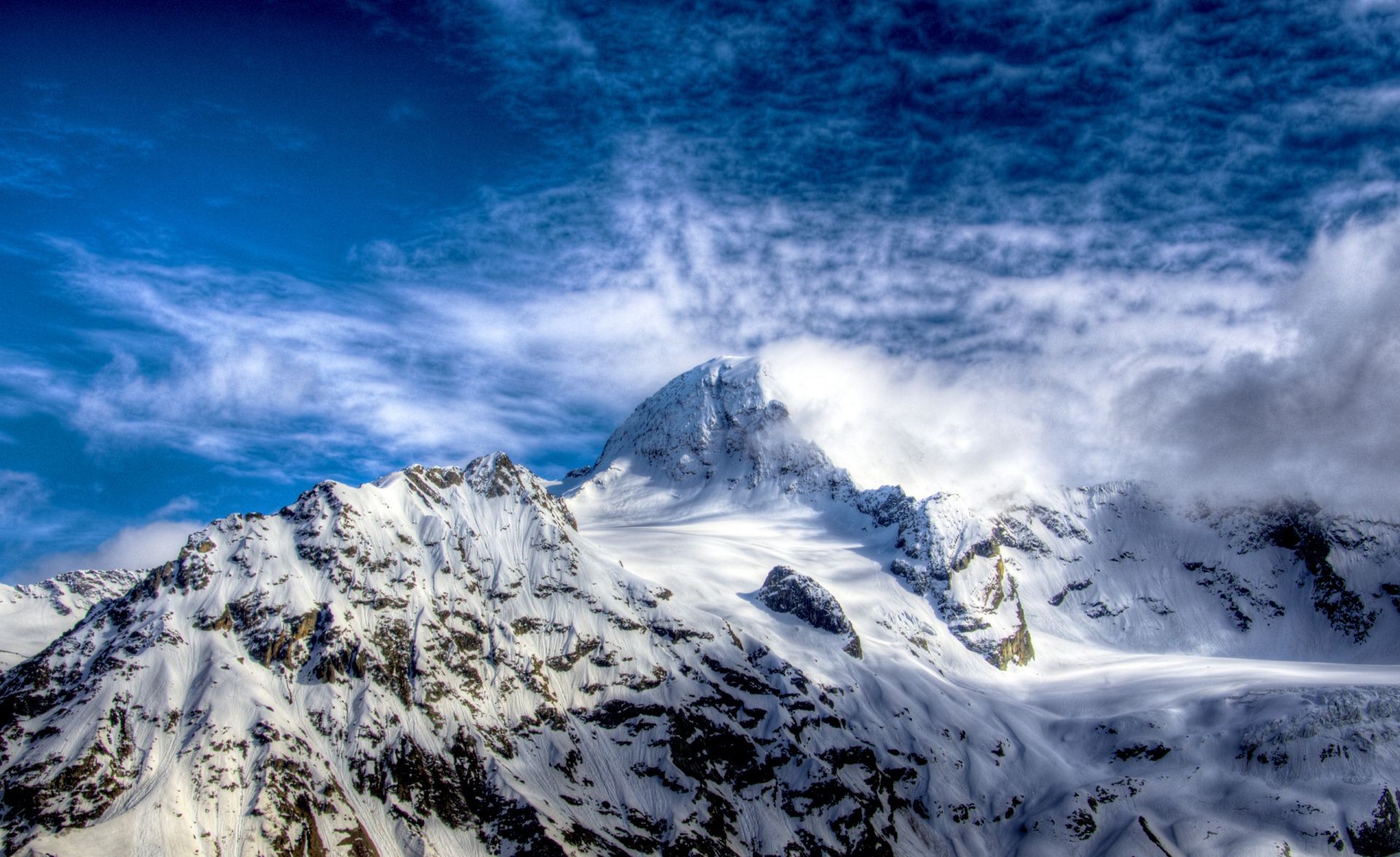 winter snow mountain ice scenic mountain peak landscape glacier high sky cold travel nature pinnacle altitude outdoors climb