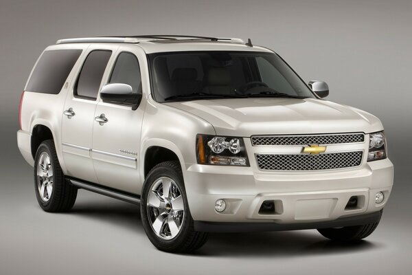 Chevrolet car, white SUV