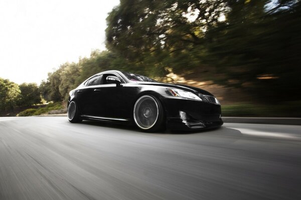 Black Lexus on the road