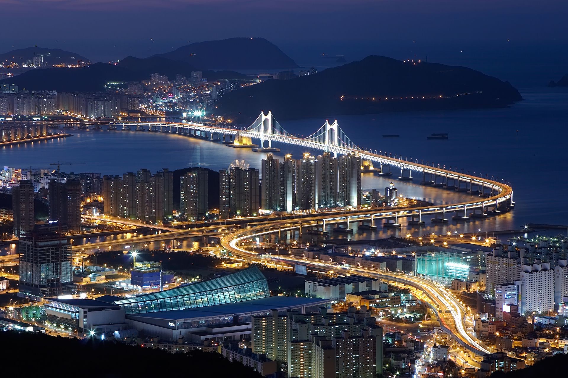 bridges city travel architecture cityscape dusk bridge water traffic evening urban building transportation system skyline sky illuminated landmark river harbor sight