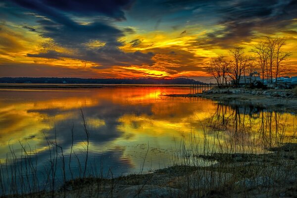 Yellow sunset over the lake