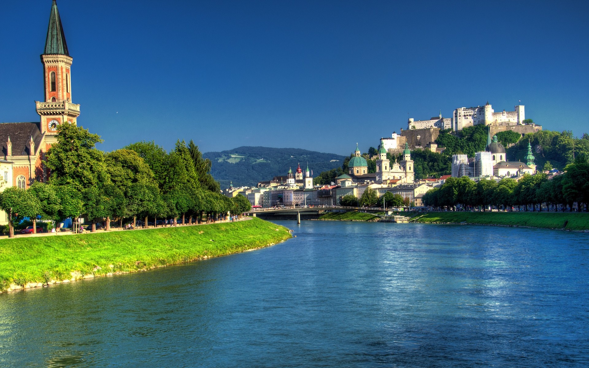 other city architecture water river church travel city outdoors building cathedral castle lake town cityscape sky daylight reflection tower tree salzach river salzburg austria