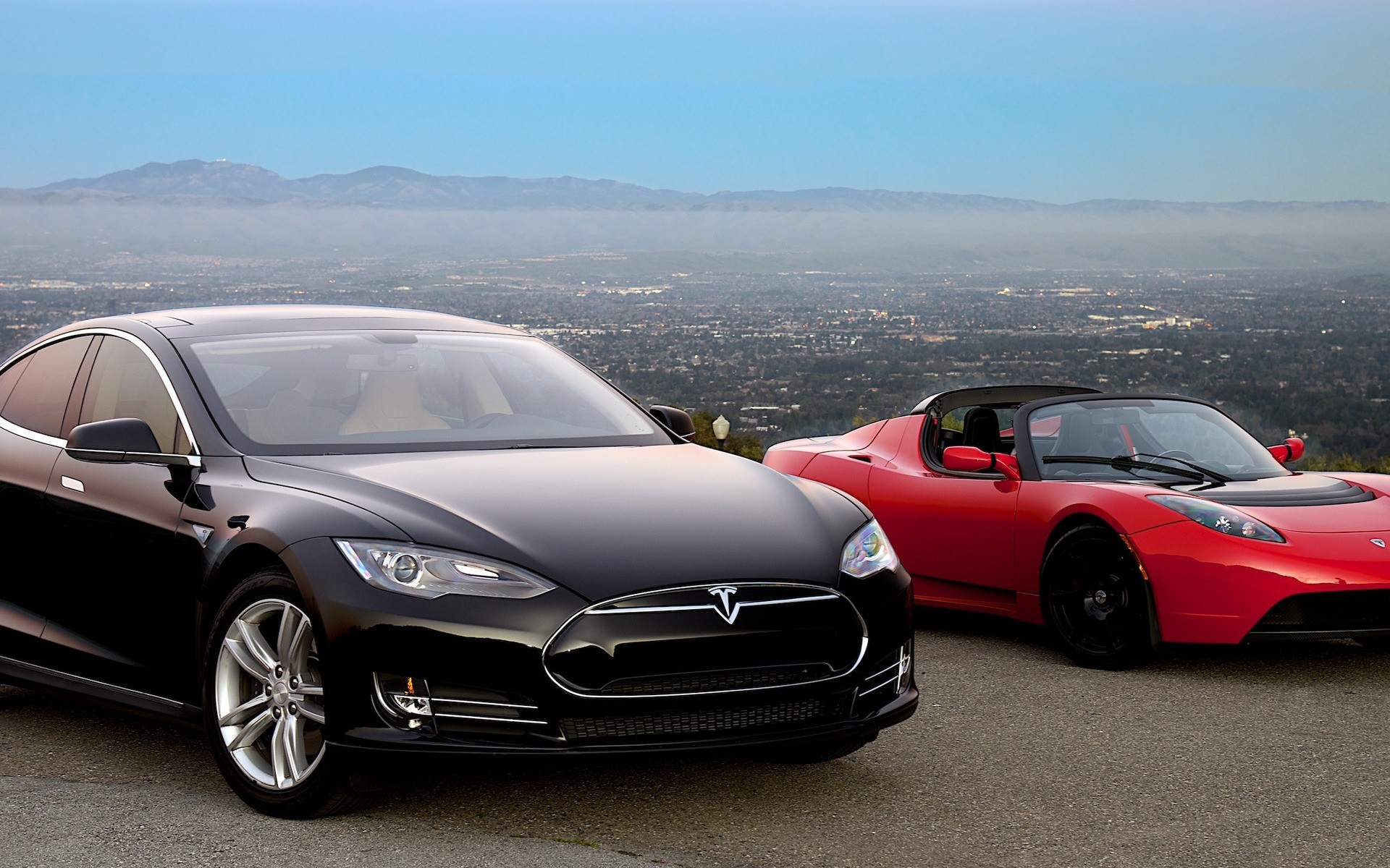 tesla coche coche negro automóvil asfalto mediodía ruedas acera coupé rápido capó sistema de transporte prisa sedán unidad convertible tesla saratoga