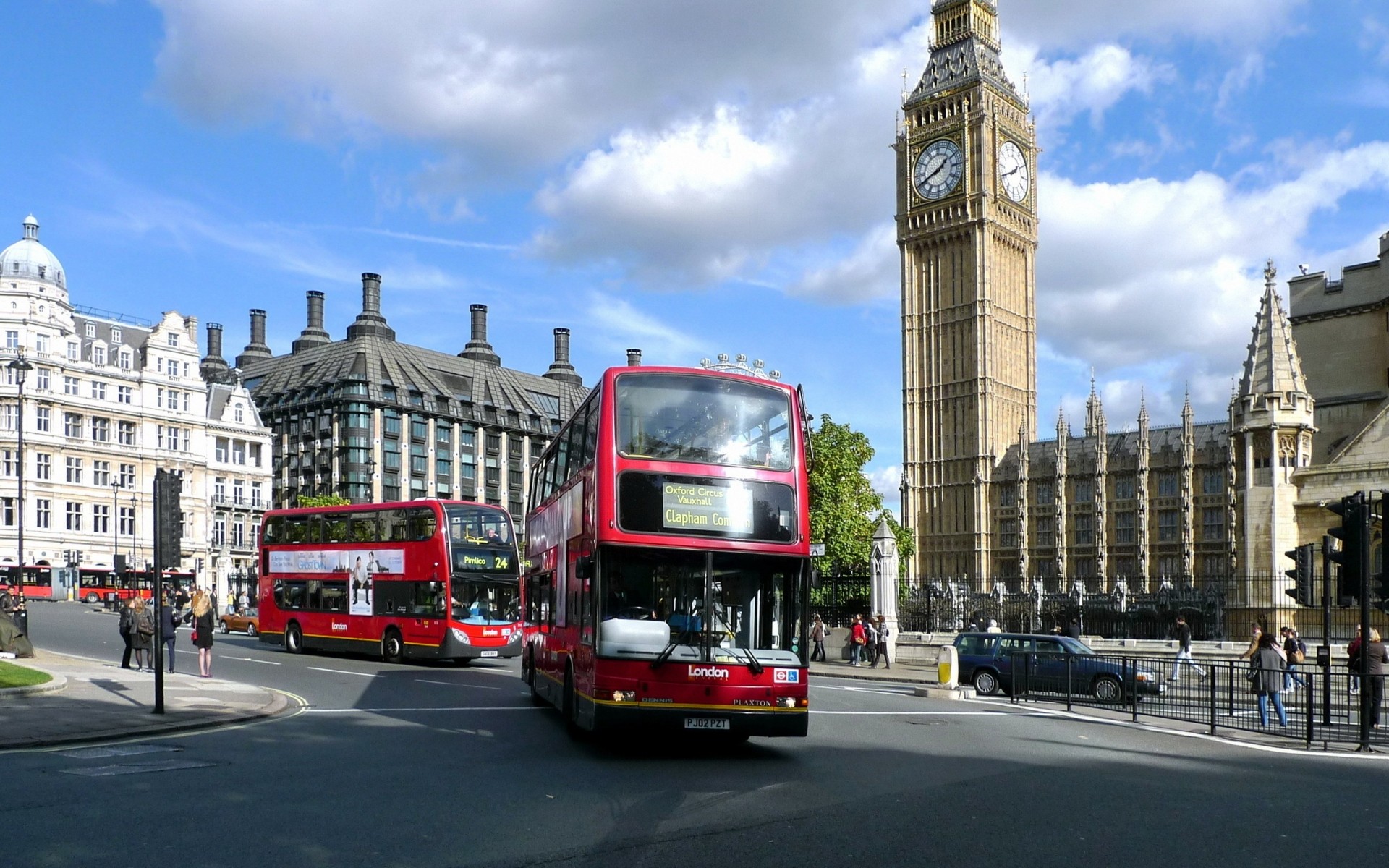 united kingdom travel city architecture building street outdoors traffic road bus transportation system parliament urban landmark tourism vehicle clock daylight sky car big ben traditional ride