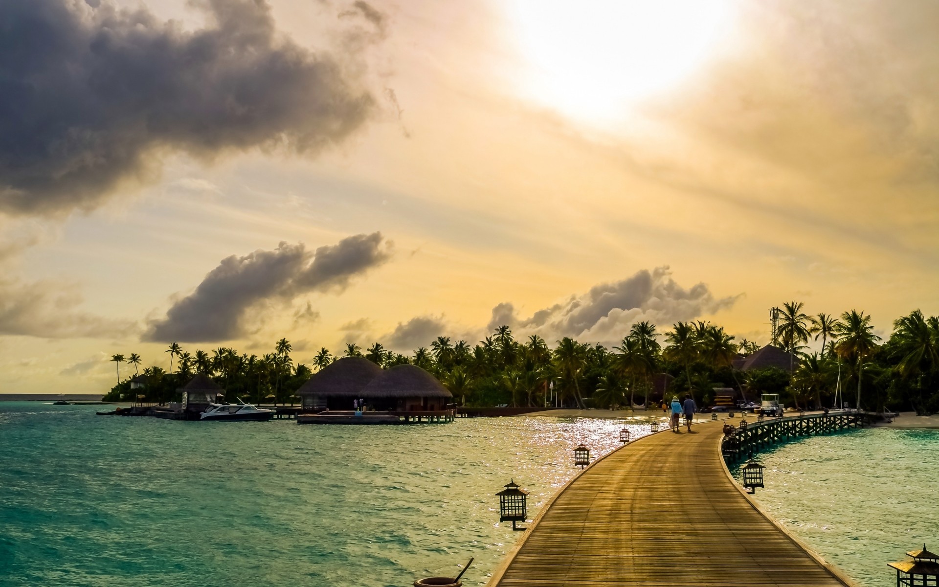 summer water sunset beach travel sun dawn sky sea ocean nature seashore tropical island tree outdoors landscape fair weather cloud maldives tropics palm trees