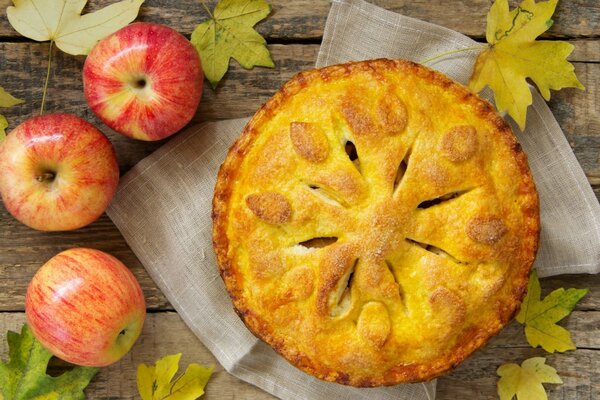 Autumn still life with pie and apples