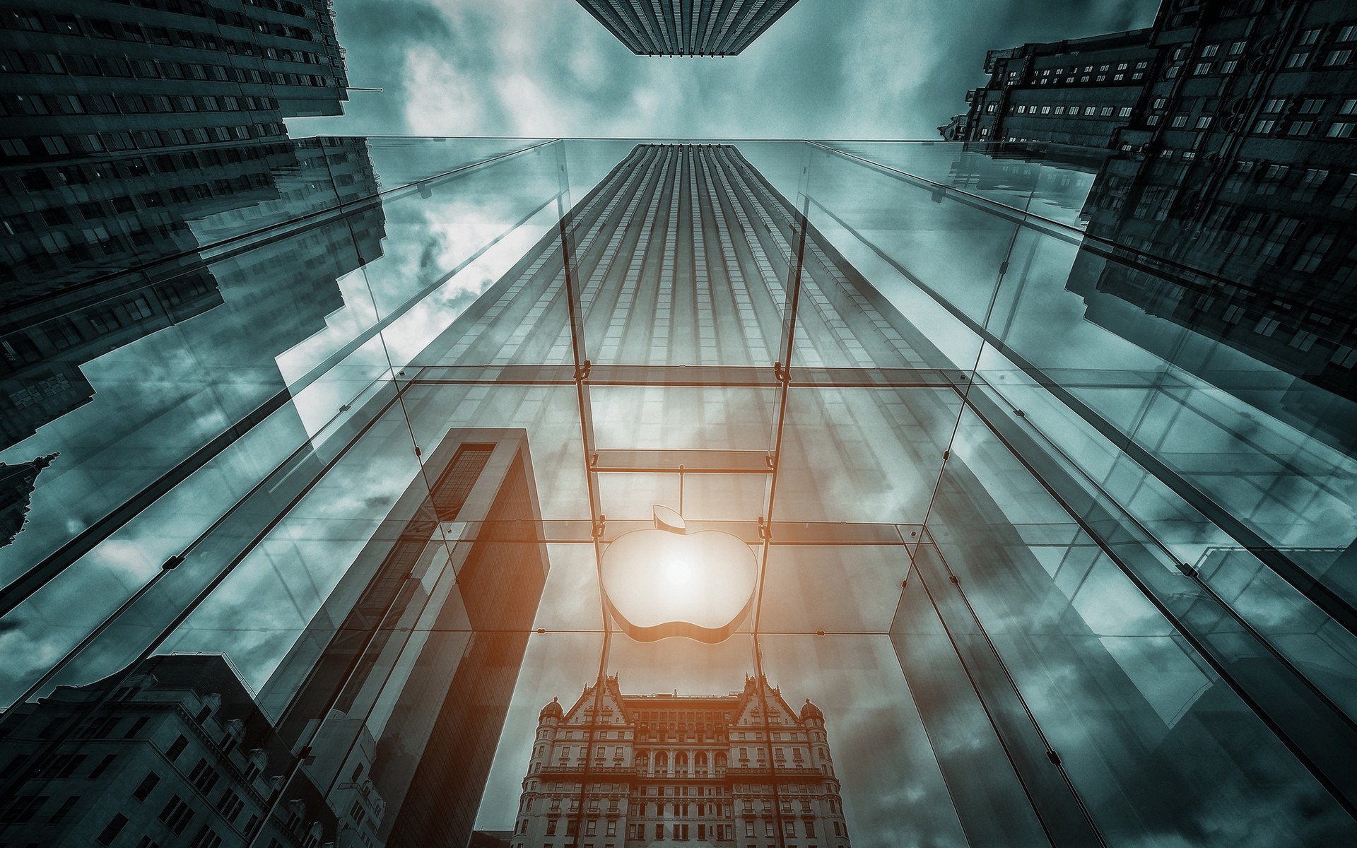 apple architecture modern city office urban building glass futuristic business window perspective reflection light skyscraper downtown construction contemporary expression tube tower apple logo logo apple apple store ny apple