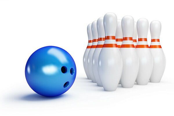 Boule et quilles de bowling sur fond sombre