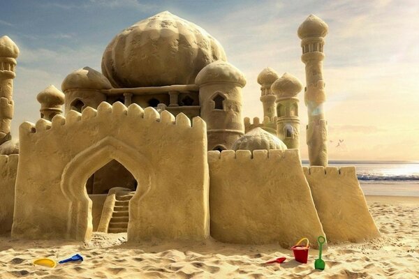 Beautiful sand castle on the seashore