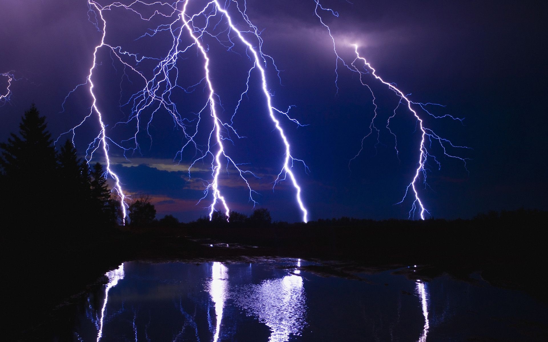 night evening twilight lightning thunder thunderbolt thunderstorm storm calamity energy flash strike rain intensity danger discharge dark hurricane dazzle thrill electricity