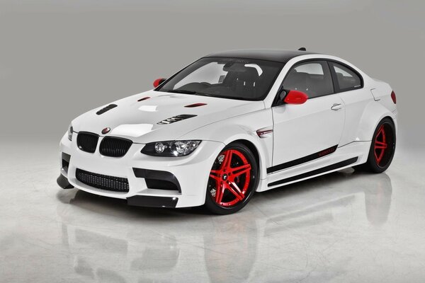 Sports BMW, white BMW, red wheels