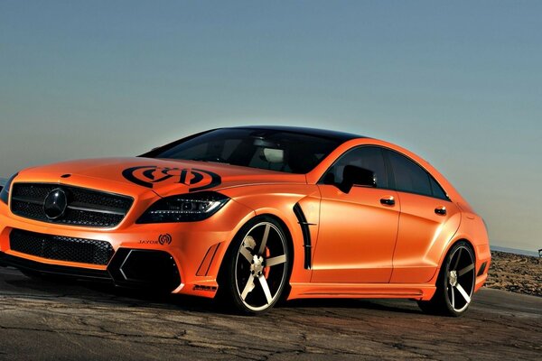 Orange sports car in the sun