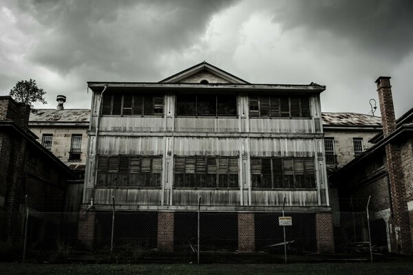 Grey gloomy house in monochrome architecture