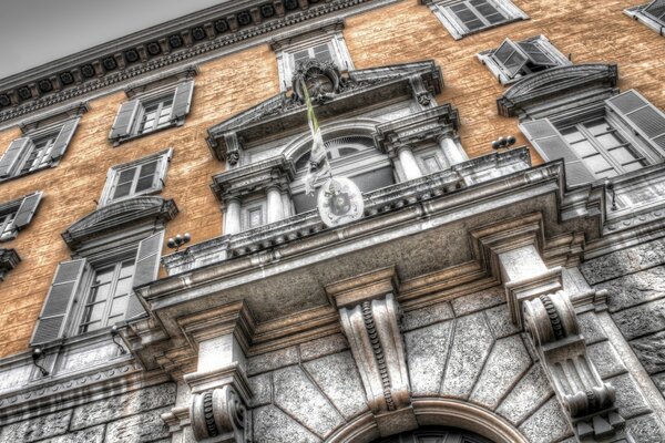 An old house with monumental stucco and Empire