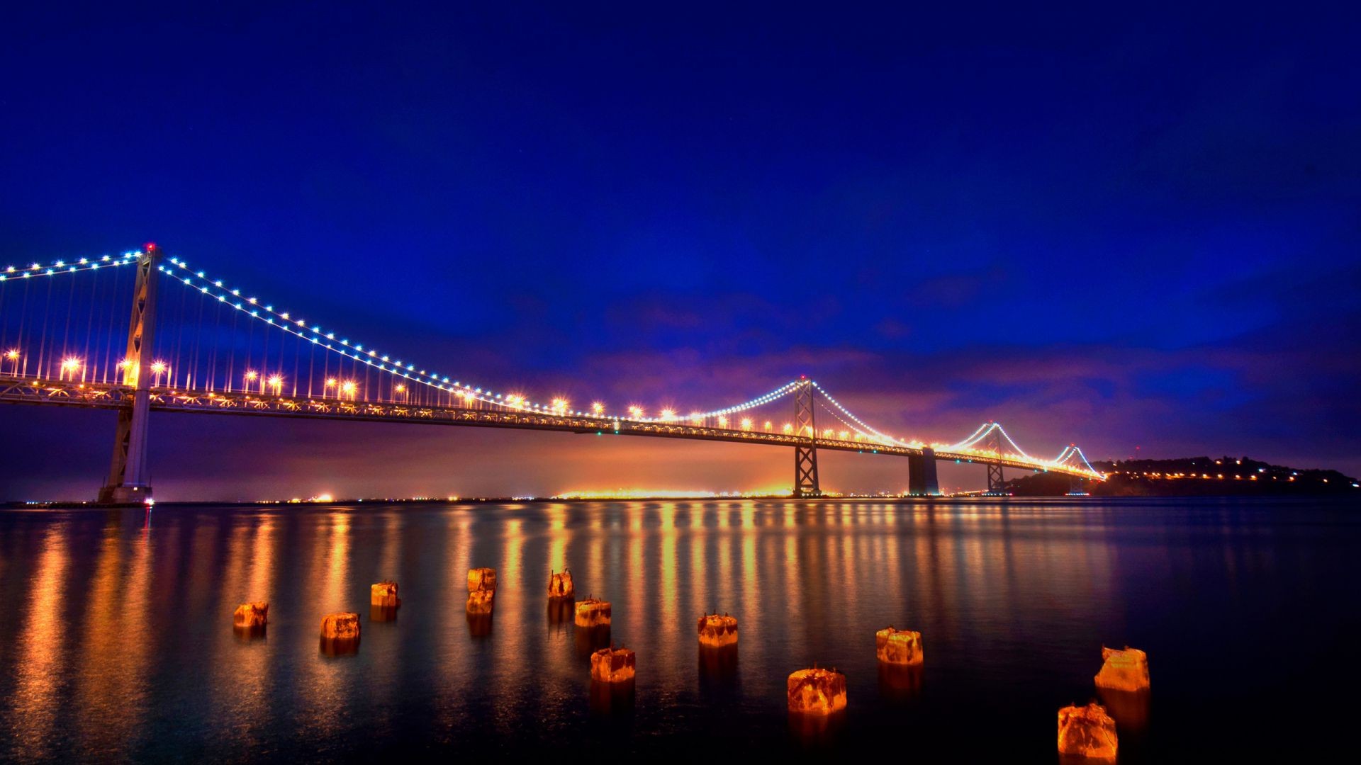 bridges bridge water suspension bridge evening sunset dusk reflection travel river connection architecture dawn suspension transportation system sky city