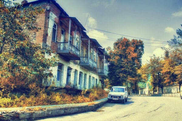 Street landscape with a car