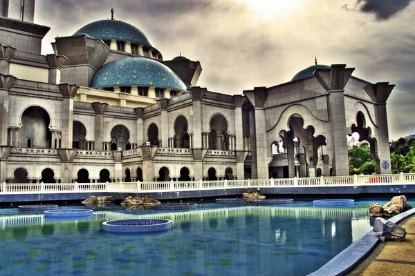 House on the river with beautiful fountains