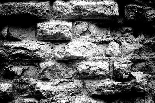 Pared de ladrillo viejo blanco y negro