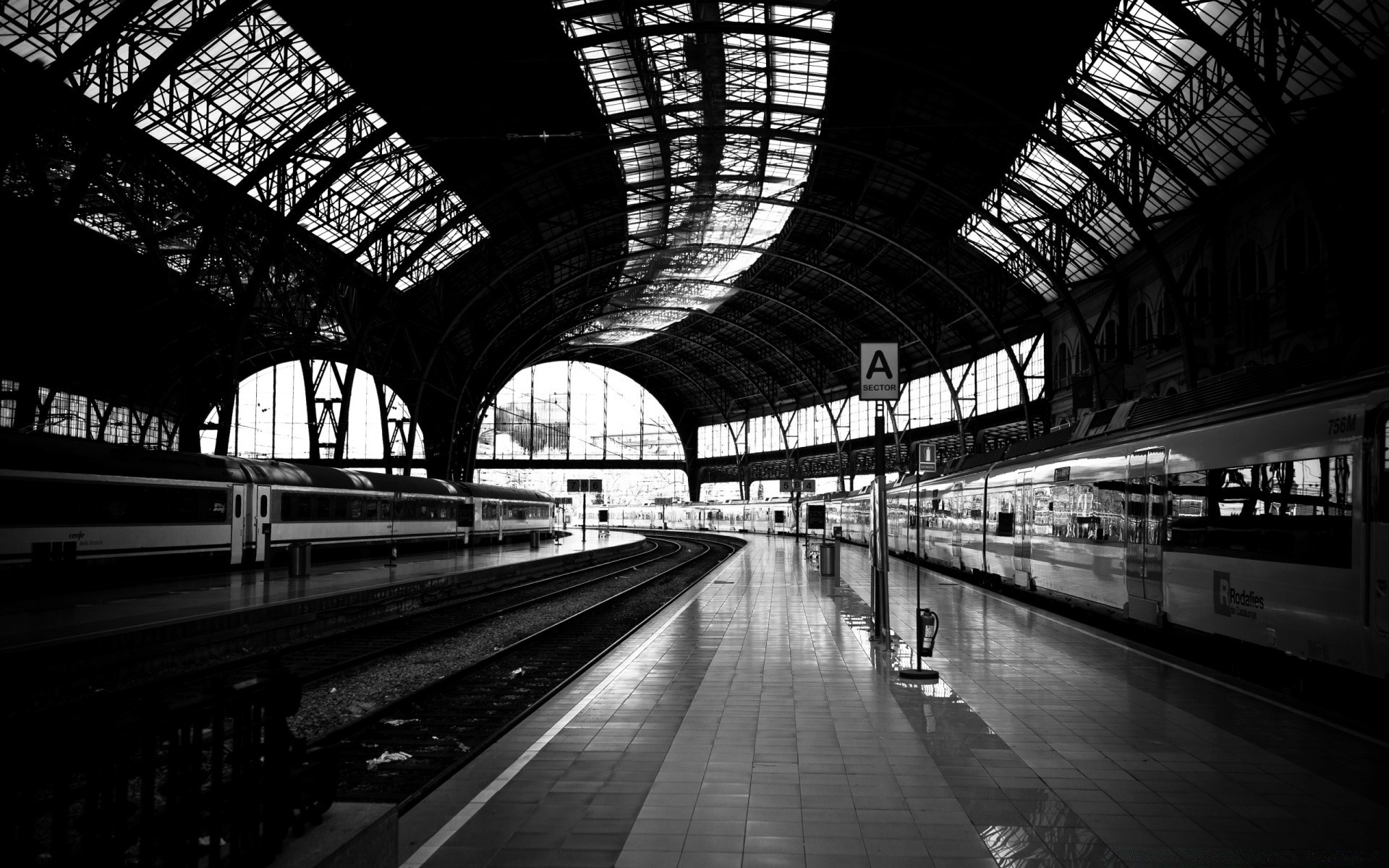 black and white train transportation system tube railway urban airport architecture city travel monochrome building tunnel station steel perspective modern light