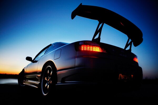 Sports car on the background of a beautiful landscape