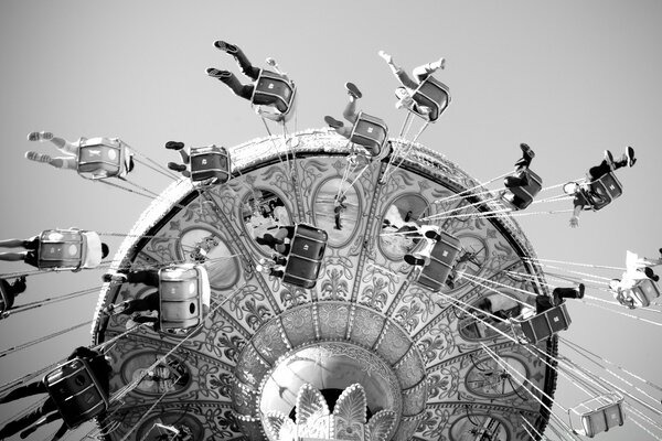 People on an amusement park ride