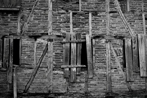 Brick wall and old boards