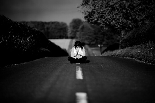 Meditation of a man in the middle of the road