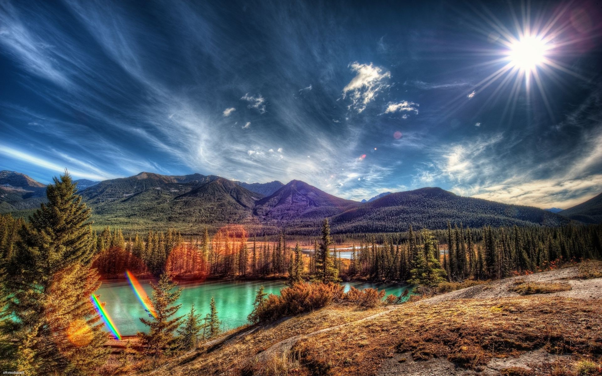 la luz del sol y los rayos paisaje naturaleza montañas viajes cielo amanecer puesta de sol nieve agua madera al aire libre lago luz hermoso escénico árbol sol otoño