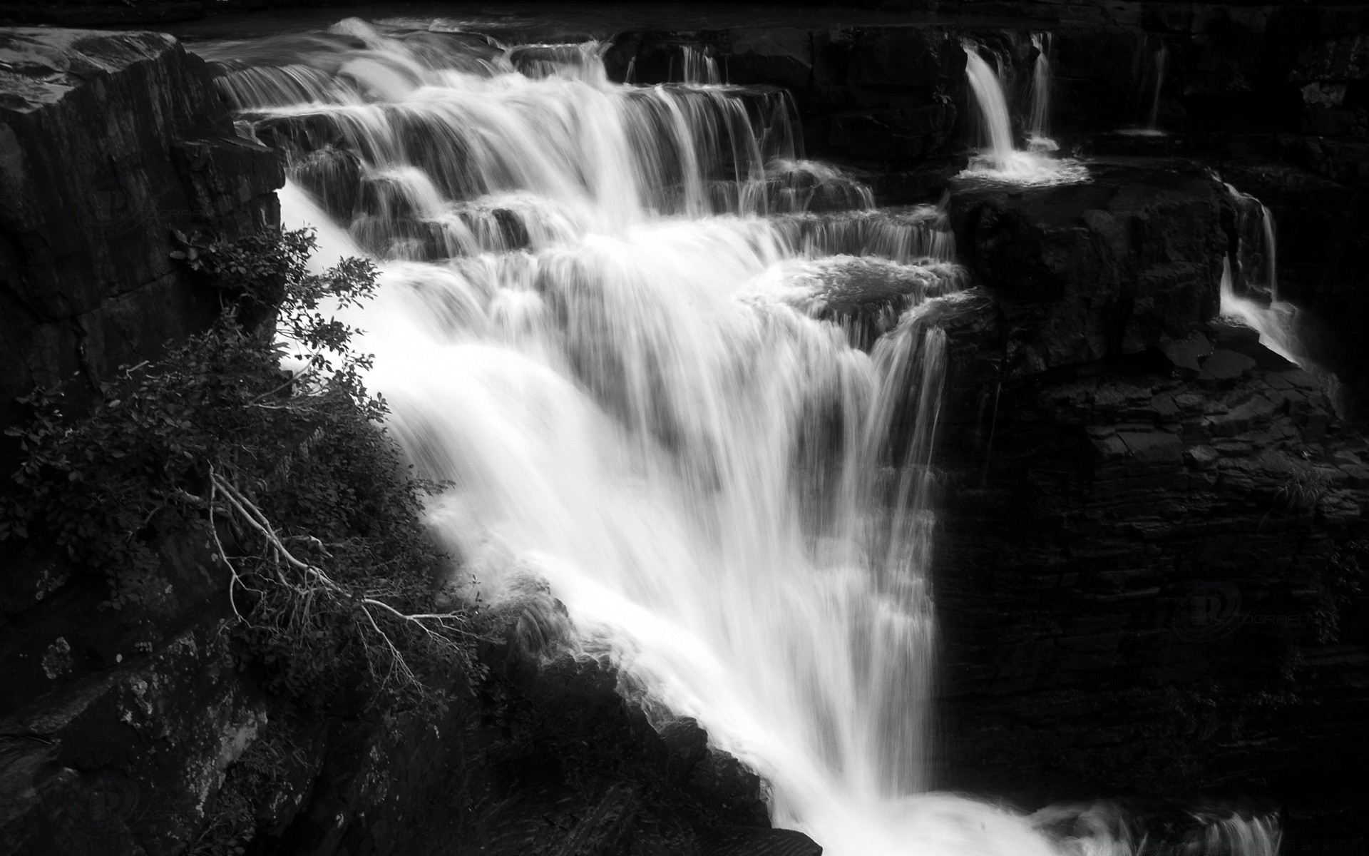 black and white waterfall water motion river stream photograph fall nature wood landscape rock travel outdoors cascade blur flow creek monochrome smooth