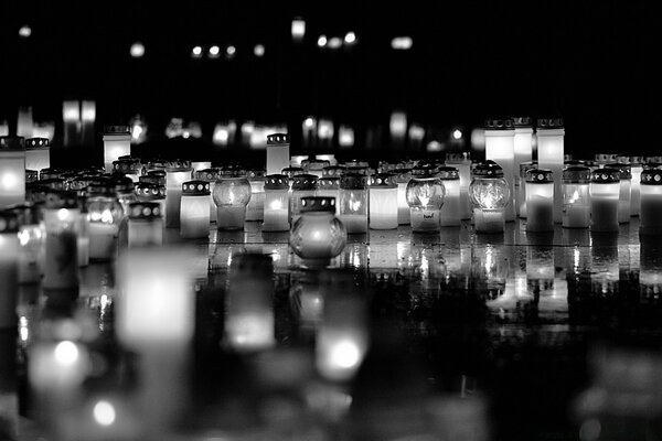 Black and white modern image of the city in the reflection of water