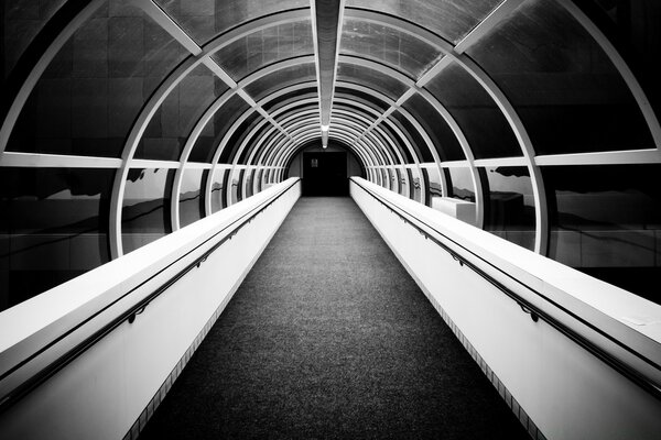 Monochrome image of the airport tunnel