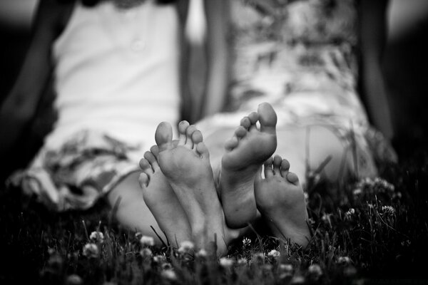 Black and white image of a family with a child and love