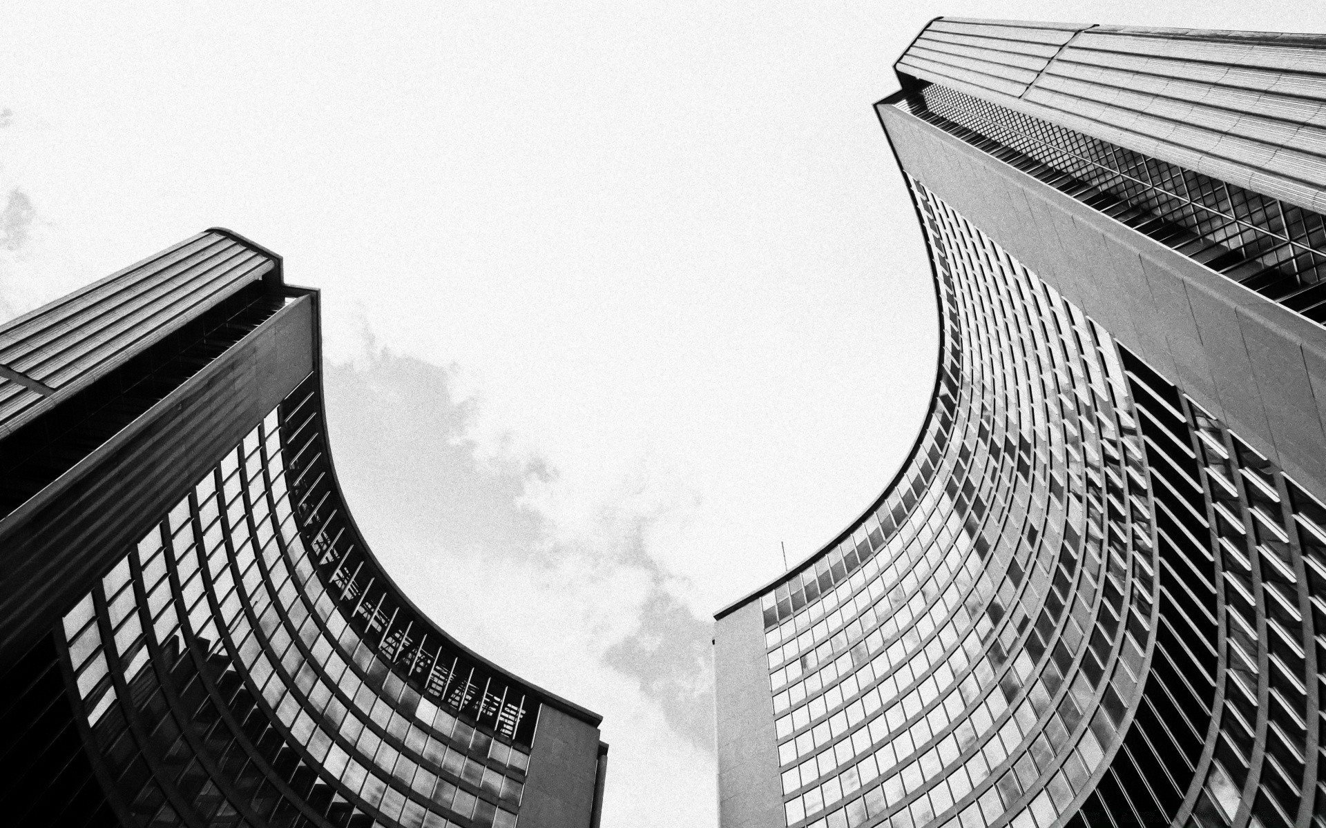 preto e branco arquitetura monocromático alto cidade aço moderno centro da cidade moderno arranha-céu escritório casa futurista vidro perspectiva o negócio céu torre cidade janelas