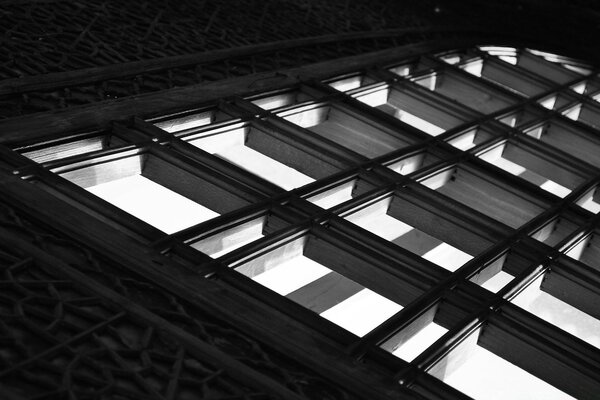 Black and white image of window architecture