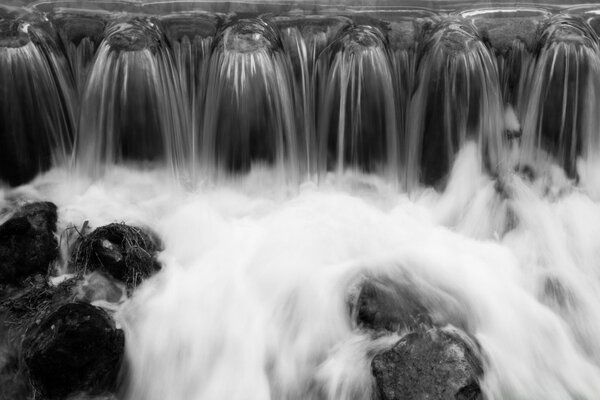 Waterfall and fog in black and white