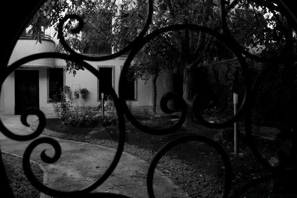 Black and white image of a vintage house