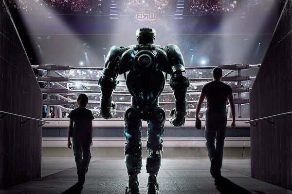 Na ring wchodzi robot w towarzystwie dwóch osób