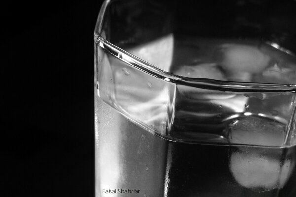 Faceted glass with water black and white