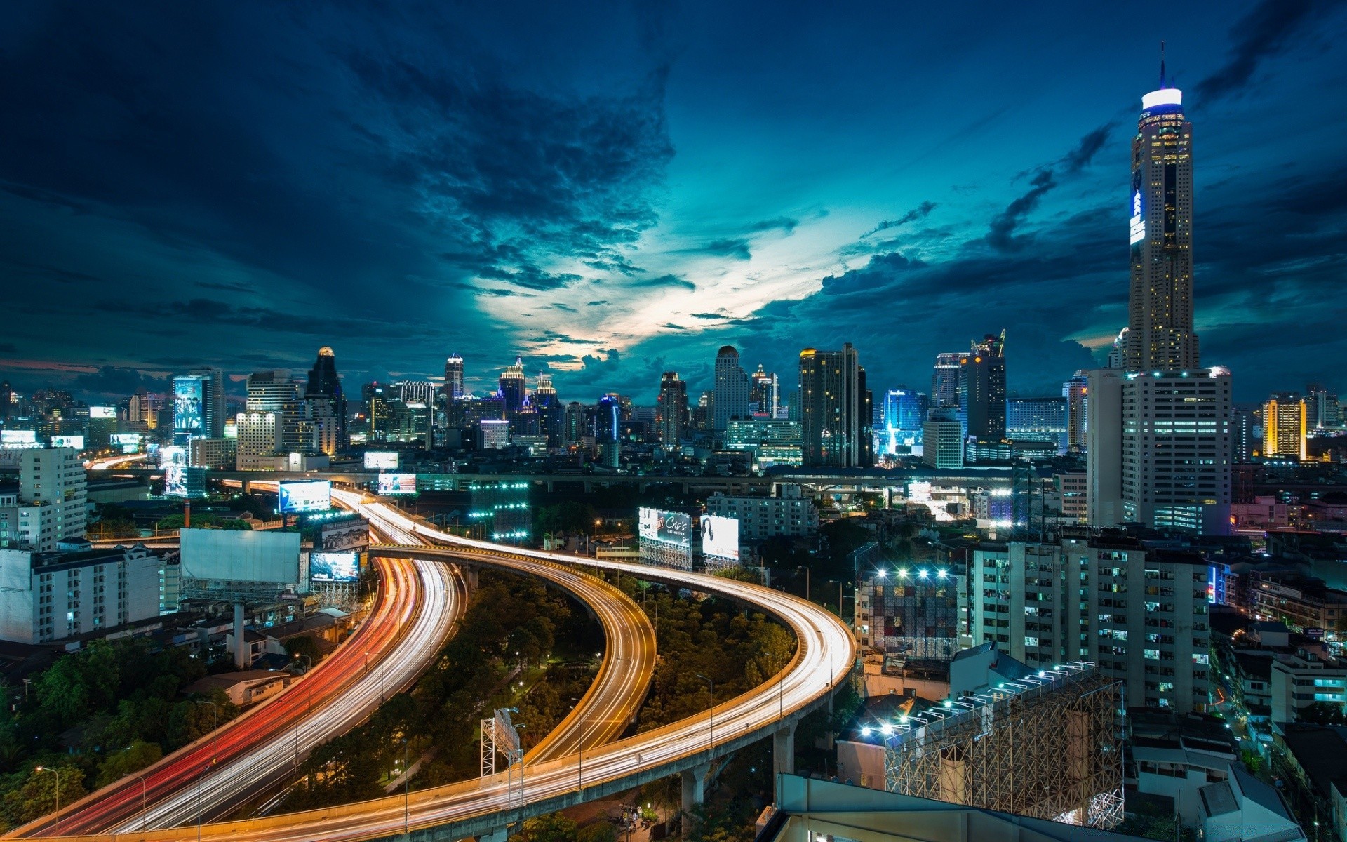 outras cidades crepúsculo cidade tráfego arranha-céu centro da cidade rodovia cidade viagens noite arquitetura skyline estrada moderno urbano casa sistema de transporte cordas negócios ponte iluminado