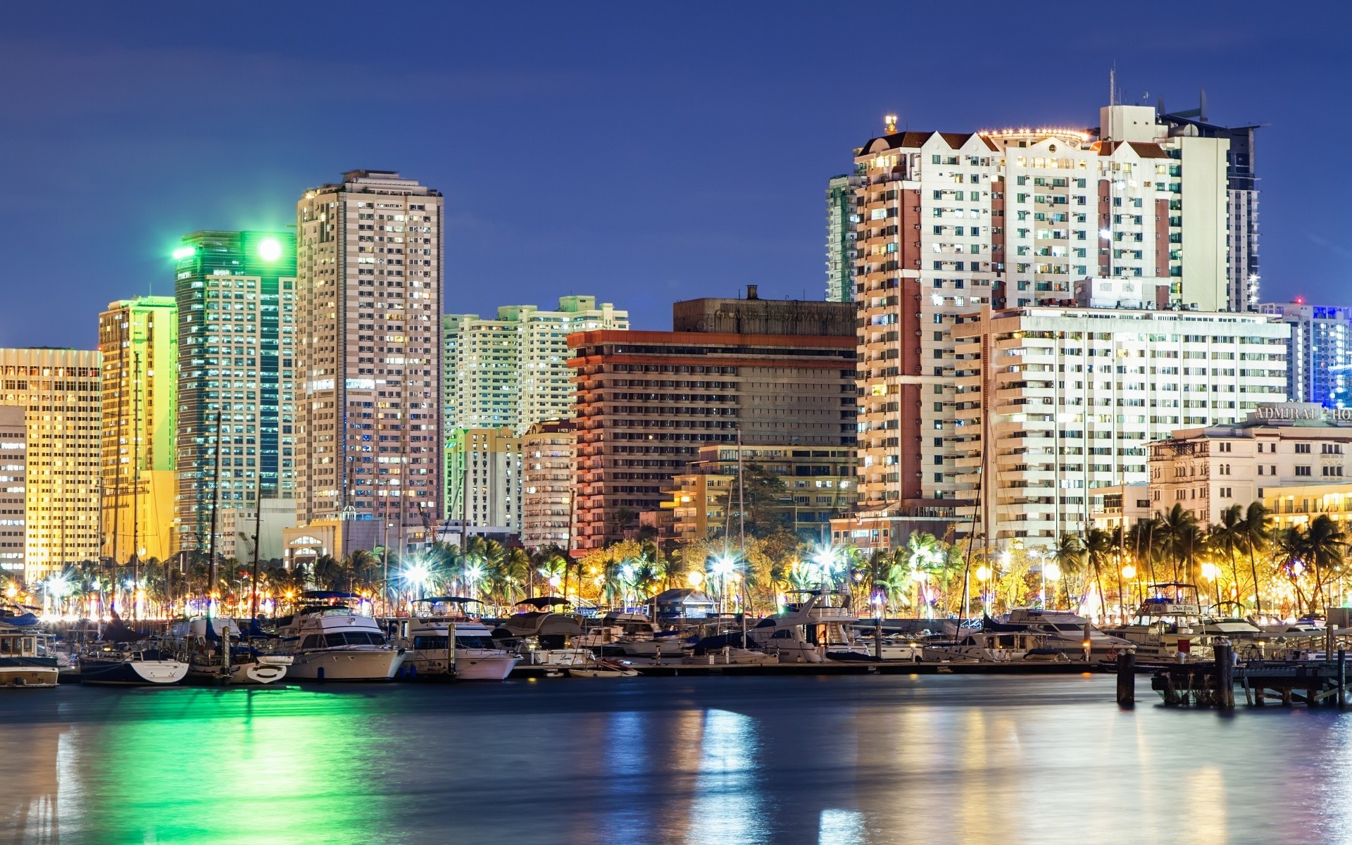 otras ciudades ciudad ciudad rascacielos skyline arquitectura hogar oficina centro de la ciudad moderno viajes paseo marítimo puerto cielo agua urbano crepúsculo reflexión marina negocio muelle