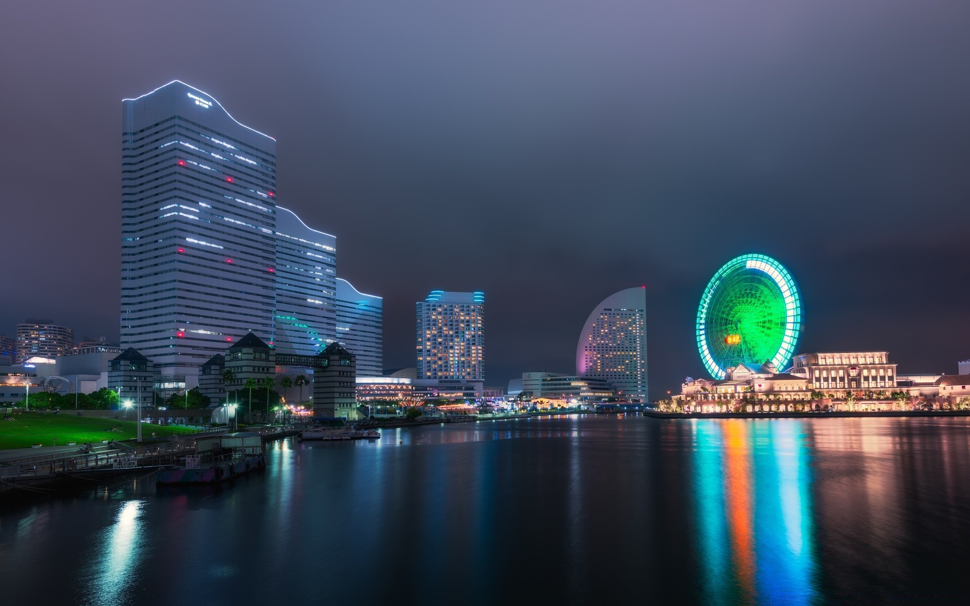 other city architecture city building travel cityscape skyline skyscraper dusk downtown sky water waterfront office reflection evening river modern harbor business