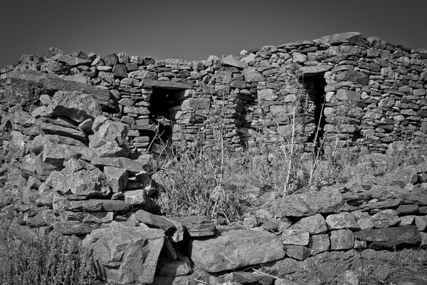 The ruins of an ancient city overgrown with grass