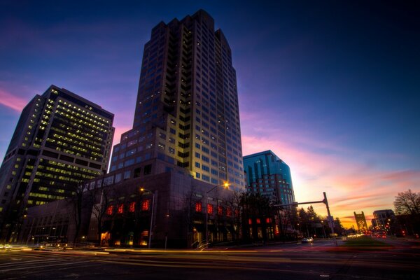 Skyscraper in the city center at sunset