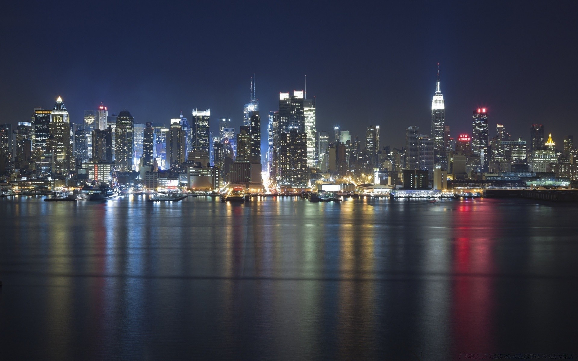 other city skyline city cityscape skyscraper architecture downtown dusk illuminated office reflection building river finance business water travel sky waterfront modern urban